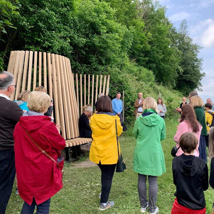 Audience attending a previous Surrey Hills Arts event on Denbies Hiliside